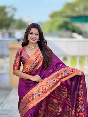 Wine elegant art silk woven saree with rich zari border 4