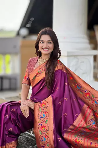 Wine elegant art silk woven saree with rich zari border