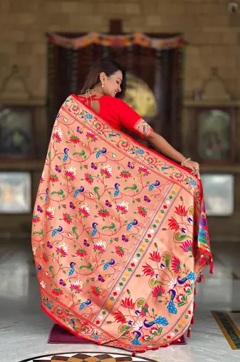 Orange elegant art silk woven saree with rich zari border