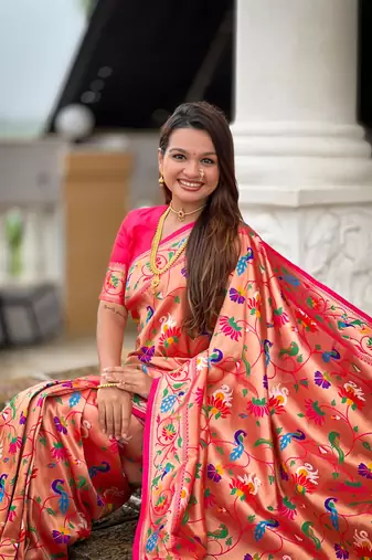 Orange elegant art silk woven saree with rich zari border