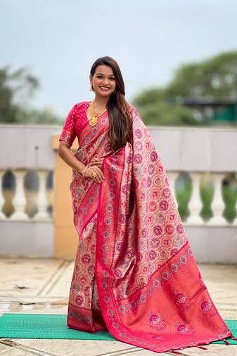 Pink elegant art silk woven saree with rich zari border