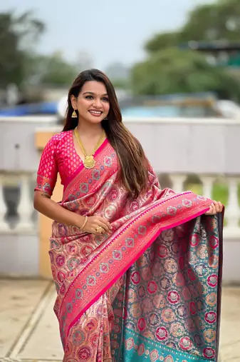 Pink elegant art silk woven saree with rich zari border