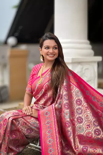 Pink elegant art silk woven saree with rich zari border