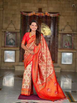 Red elegant art silk woven saree with rich zari border 1