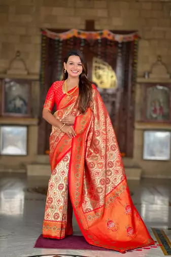 Red elegant art silk woven saree with rich zari border