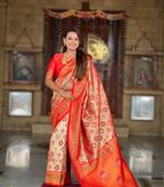 Red elegant art silk woven saree with rich zari border