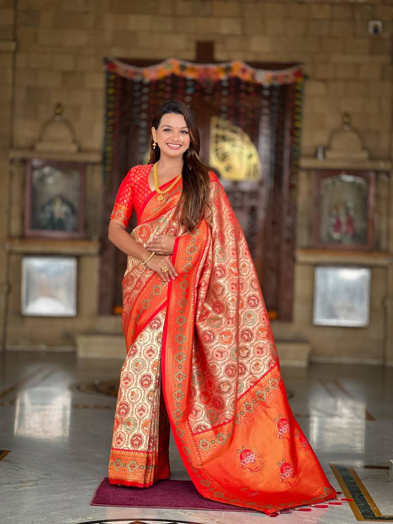 Red elegant art silk woven saree with rich zari border