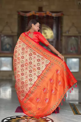 Red elegant art silk woven saree with rich zari border
