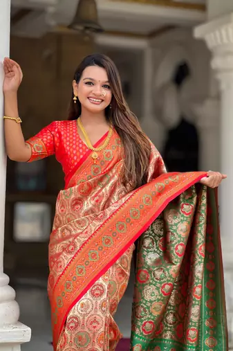 Red elegant art silk woven saree with rich zari border