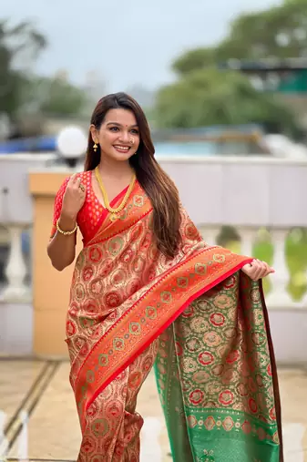 Red elegant art silk woven saree with rich zari border