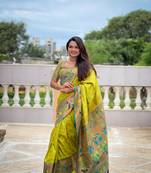 Green elegant art silk woven saree with rich zari border
