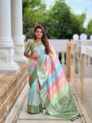 Green elegant art silk woven saree with rich zari border 1