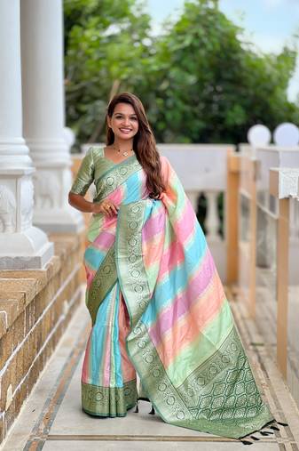 Green elegant art silk woven saree with rich zari border