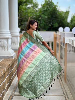 Green elegant art silk woven saree with rich zari border 2
