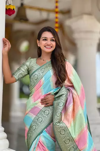 Green elegant art silk woven saree with rich zari border