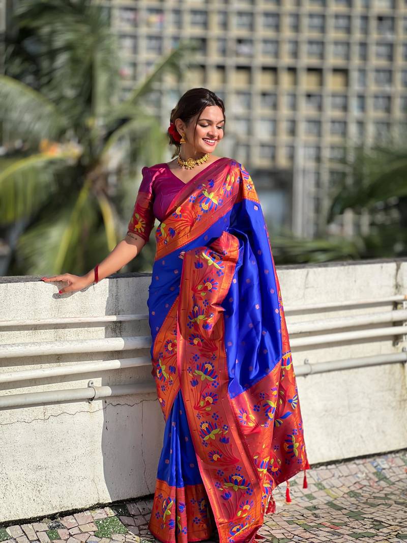 Blue elegant art silk woven saree with rich zari border