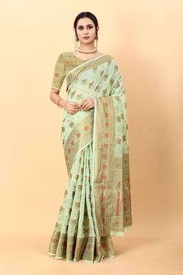 Green elegant art silk woven saree with rich zari border 1