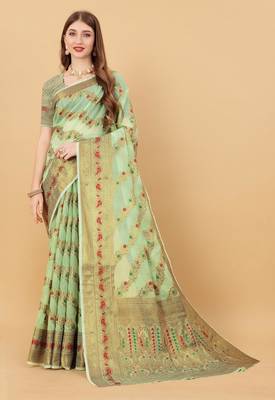 Green elegant art silk woven saree with rich zari border 1
