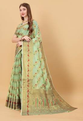 Green elegant art silk woven saree with rich zari border 2