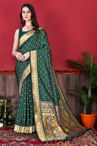 Green elegant art silk woven saree with rich zari border