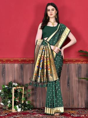 Green elegant art silk woven saree with rich zari border 2