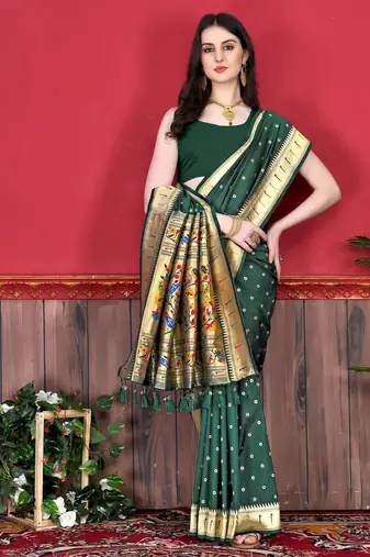 Green elegant art silk woven saree with rich zari border