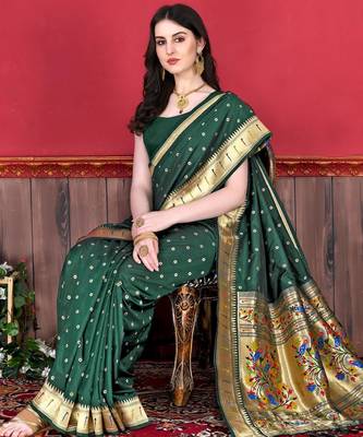 Green elegant art silk woven saree with rich zari border 3