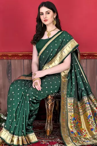 Green elegant art silk woven saree with rich zari border
