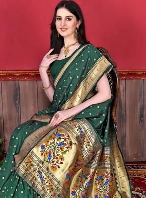 Green elegant art silk woven saree with rich zari border 4