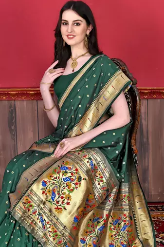 Green elegant art silk woven saree with rich zari border