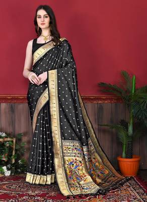 Black elegant art silk woven saree with rich zari border 1