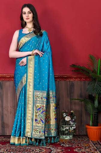 Turquoise elegant art silk woven saree with rich zari border