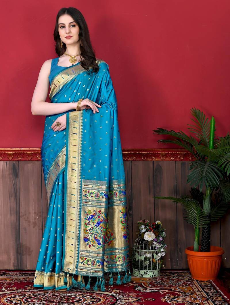Turquoise elegant art silk woven saree with rich zari border