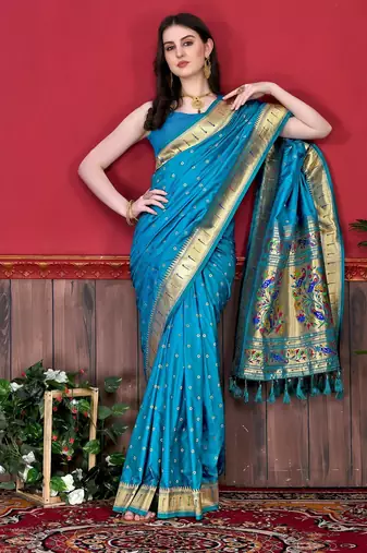 Turquoise elegant art silk woven saree with rich zari border
