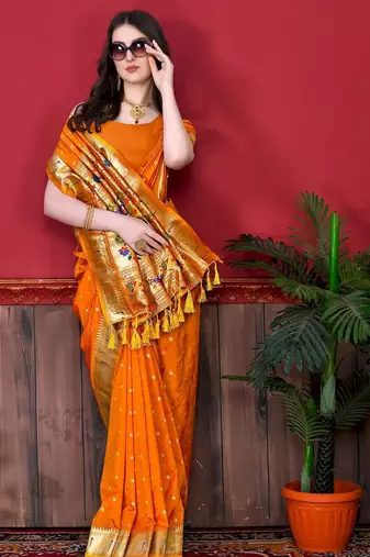 Orange elegant art silk woven saree with rich zari border