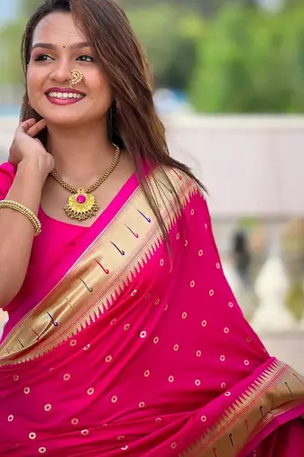 Pink elegant art silk woven saree with rich zari border