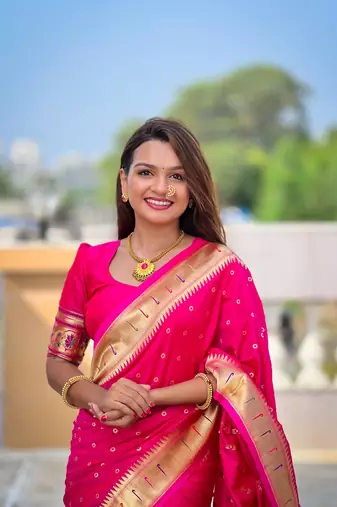 Pink elegant art silk woven saree with rich zari border