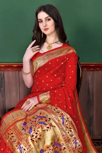 Red elegant art silk woven saree with rich zari border