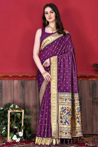 Wine elegant art silk woven saree with rich zari border
