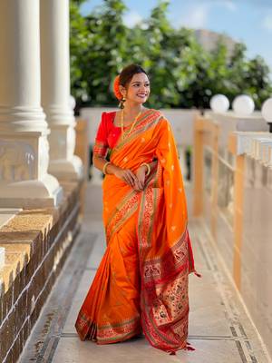 Orange elegant art silk woven saree with rich zari border 2