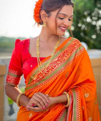 Orange elegant art silk woven saree with rich zari border 5