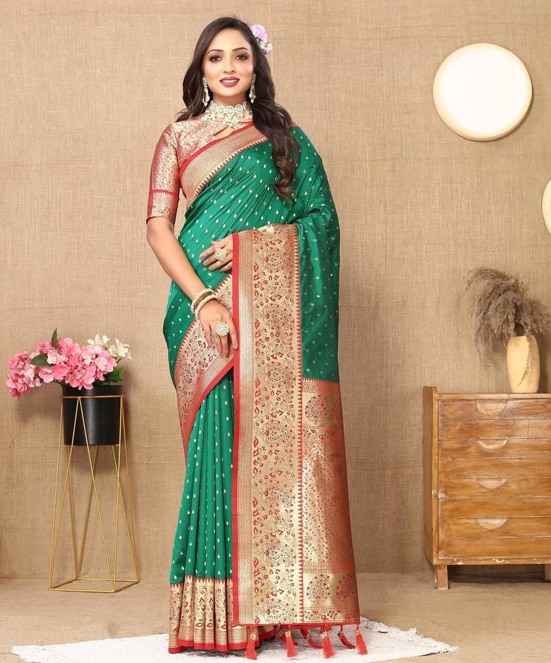 Green elegant art silk woven saree with rich zari border