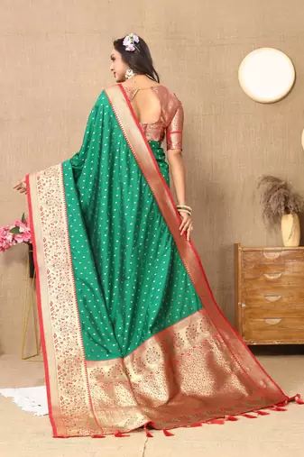 Green elegant art silk woven saree with rich zari border