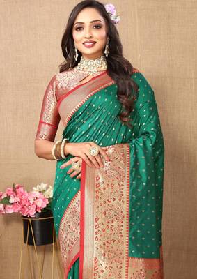Green elegant art silk woven saree with rich zari border 3