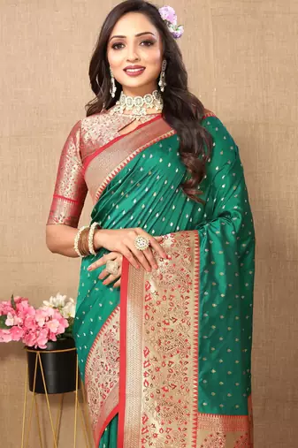 Green elegant art silk woven saree with rich zari border