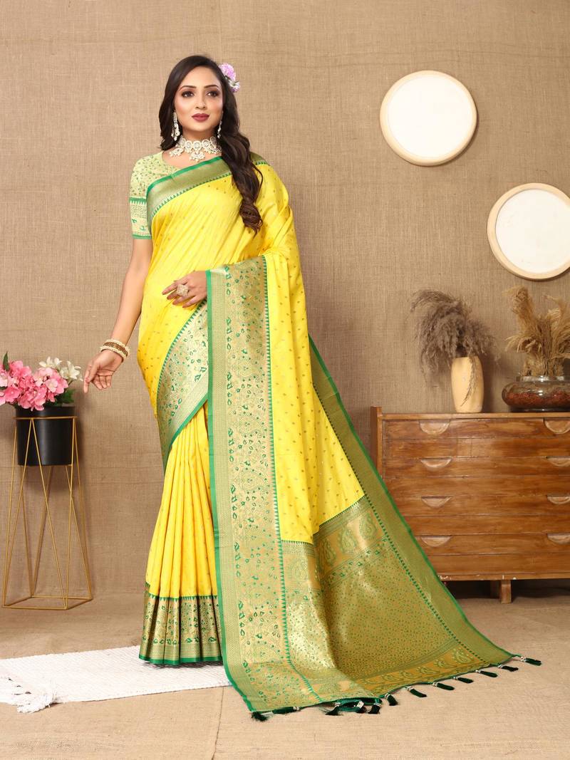 Yellow elegant art silk woven saree with rich zari border