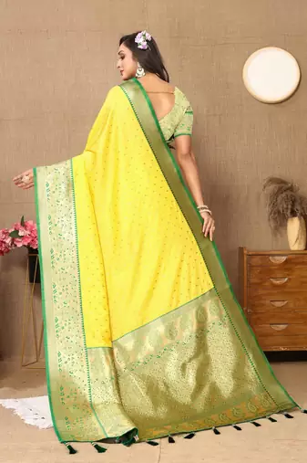 Yellow elegant art silk woven saree with rich zari border