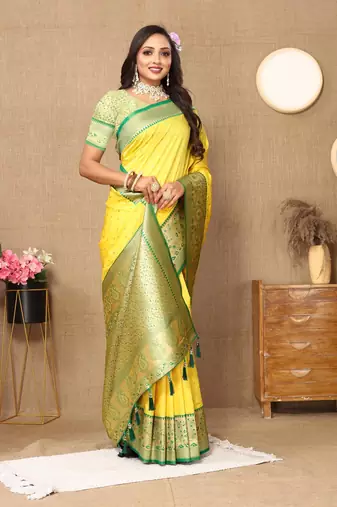 Yellow elegant art silk woven saree with rich zari border
