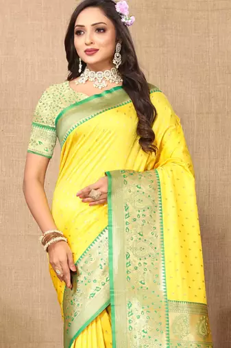 Yellow elegant art silk woven saree with rich zari border