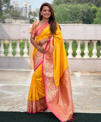 Yellow elegant art silk woven saree with rich zari border 1